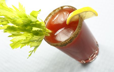 bloody or mary caesar drink with celery and ice cube. Shallow depth of field.の写真素材
