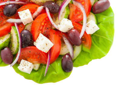 Fresh and healthy greek salad isolated on white background . Space to add your text.の写真素材
