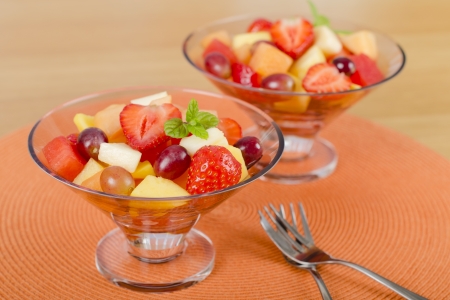 Fruit Salad - A colourful variety of fruit in glass bowls  Refreshing light meal の写真素材
