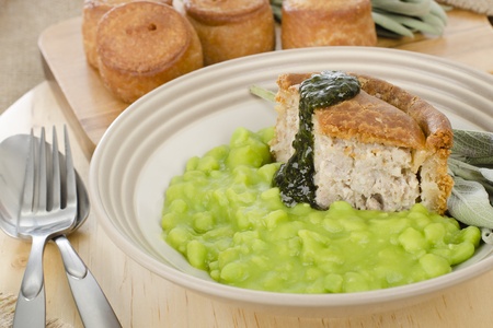 Melton Mowbray Pork Pie   Mushy Peas の写真素材