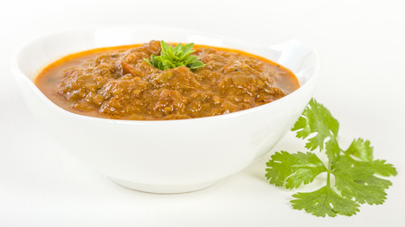 Baigan Bharta - Roasted mashed aubergines cooked with onions, tomatoes and spices.の写真素材