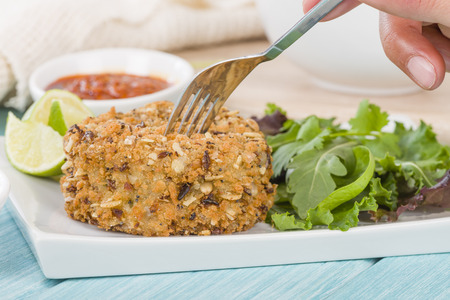 Fishcake - Deep-fried tuna, lime and coriander fishcake served with salad.