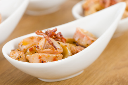 Fried Squid Rings - Pan fried squid rings with red pepper.