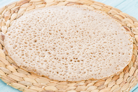 Injera - Ethiopian sourdough flatbread.の写真素材