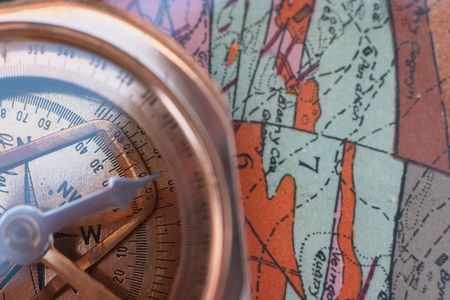 Surveying compass on part of old geological map (from paper in 1926 Quarterly Journal of the Geological Soc, London, therefore out of copyright).の写真素材