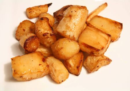 Parsnips roasted golden-brown in the ovenの写真素材