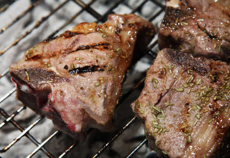 Lamb chops on a barbecueの写真素材