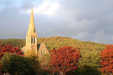 A Church in the Scottish town of Peebles, hidden among the treesの写真素材