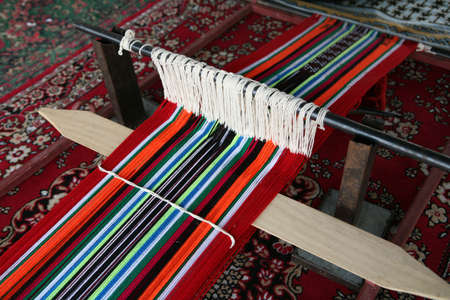 A traditional, simple, Arab loom set up to produce the sort of cloth that is common throughout the Arab world.の写真素材