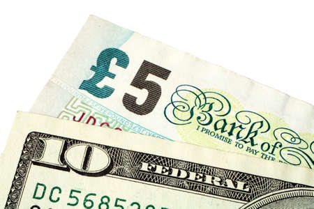 A five pound note and a ten dollar bill - the dollar moved above the 2:1 level on April 18, 2007.