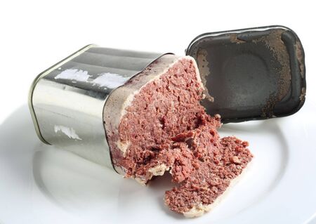 A tin of corned beef, or bully beef, open on a plateの写真素材