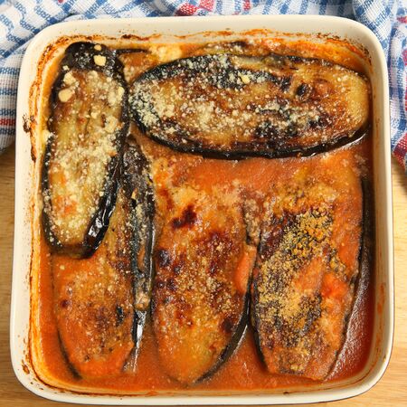 Aubergine parmigiana in a cooking potの写真素材