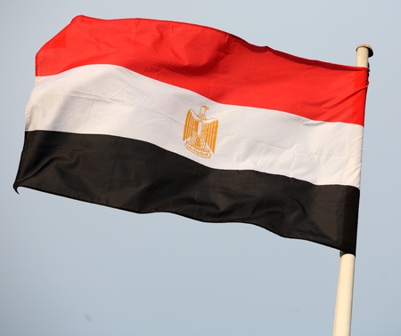 The Egyptian national flag flying in Doha, Qatar, during an international conferenceの写真素材