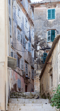 An alley full of once majestic but now crumbling and dilapidated buildings dating from the Venetian era.の写真素材