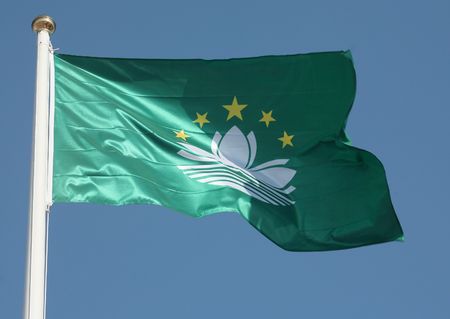 The flag of the Macao Special Administrative Region of China, formerly a Portuguese colonyのeditorial素材