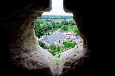 A Peek Through An Opening at Sleeping Beauty Castleの写真素材