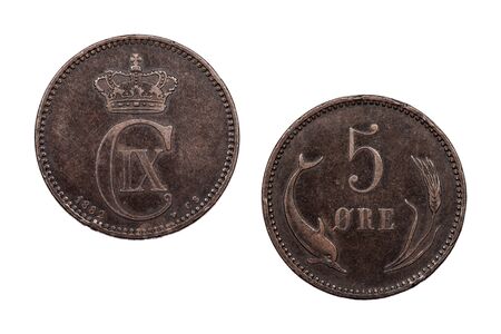 A five Ore coin from Denmark minted 1882 and isolated onto a white background.の写真素材