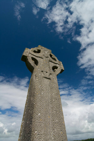 Historic celtic high stone cross at medieval church in village of Kilfenora, County Clare, Irelandの写真素材