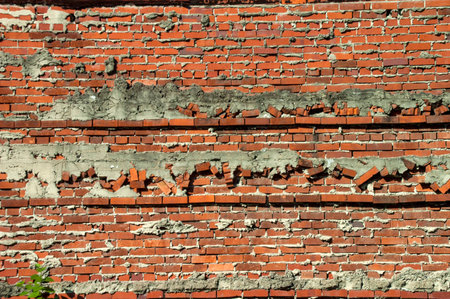 Brick wall background pattern with cement joints exposedの写真素材