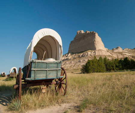 Covered wagon on Oregon Trail at Scotts Bluff National Monument, Nebraskaの写真素材