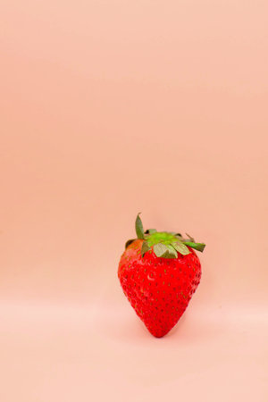 Strawberry isolated on pink background with copy space for text.の写真素材