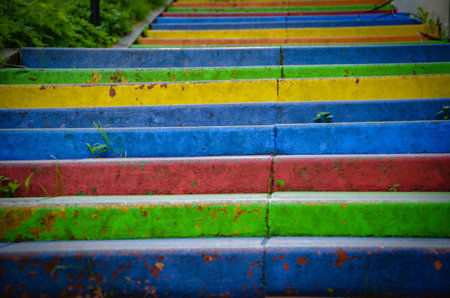 Colorful stairs in the park, close up. Selective focus. colorful stairs an unusual attraction in...
