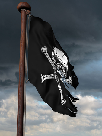Tattered pirate flag flying high on a windy dayの写真素材