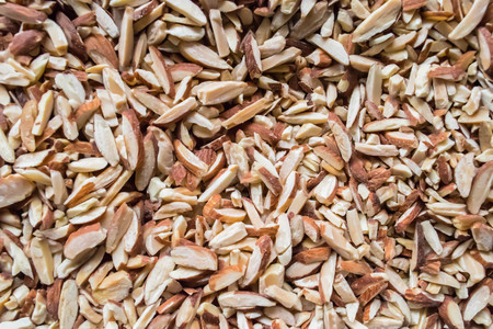 sliced almonds in a bowlの写真素材