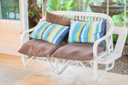 beautiful modern chair in garden,selective focus.の写真素材