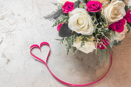 valentine's day background,red heart with red white rose ,ribbon and present box decoration,selective focusの写真素材