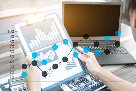 business technology concept,Business people hands use smart phone and laptop for business analyst...