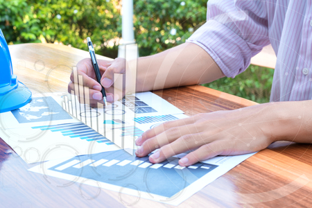 business technology concept,business people discussing the charts and graphs showing the results of their successful teamwork,selective focus.の写真素材