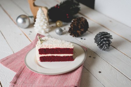 red velvet cake with white cream decoration on white table for holiday celebration ,selective focus.の写真素材