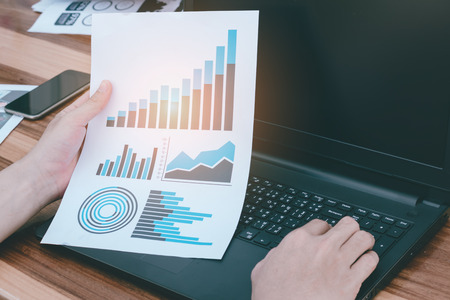 business technology concept,business people discussing the charts and graphs showing the results of their successful teamwork,selective focus. の写真素材