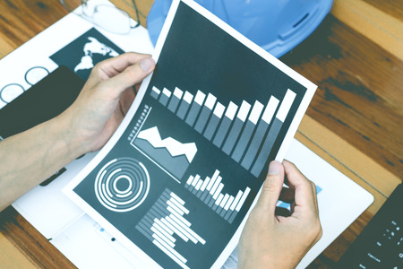 business statistics success concept : businessman analytics financial accounting market chart and...