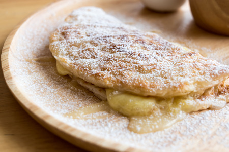 closeup fresh homemade dessert soft vanila roti with cool ice cream ,sweet syrup ,delicious...