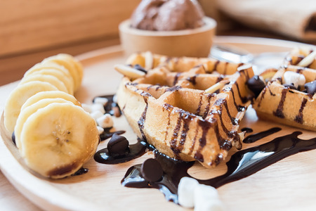 delicious sweet dessert : homemade waffle with chocolate sauce ,selective focus.の写真素材