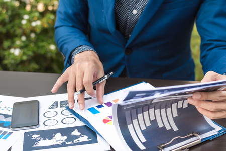 business statistics success concept : businessman analytics financial accounting market chart and graph line  ,selective focus. の写真素材