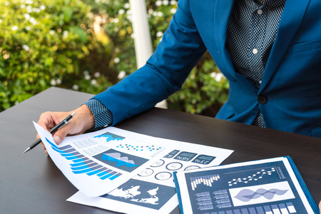 business statistics success concept : businessman analytics financial accounting market chart and...