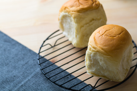 closeup delicious sweet homemade fresh organic bun , table of bread bakery view ,selective focusの写真素材