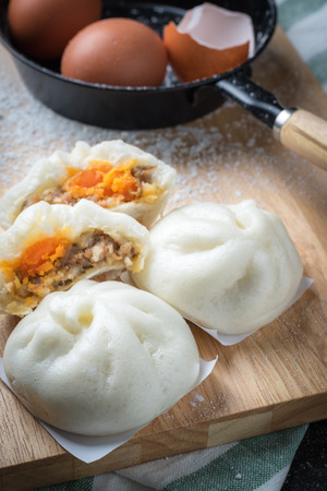 chinese steamed buns on wood container , selective focus.の写真素材
