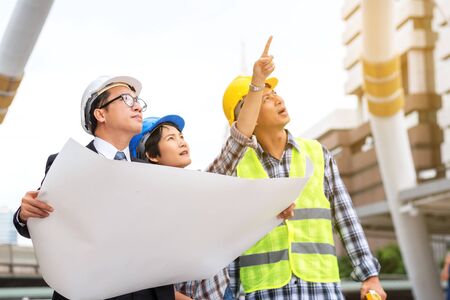 engineering construction concept : professional engineer team meeting foreman group plan...