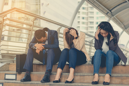 business fail concept : businessman stressed sitting ,problem life balance ,selective focus の写真素材
