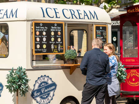 June 2020 York UK ice cream van and customers in the summer sunshineのeditorial素材