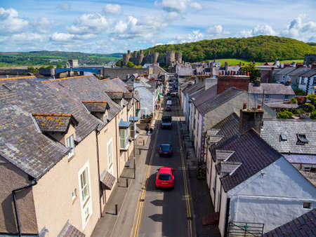 Conway village north Wales UK aerial view down the street to the castle