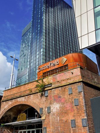 Manchester, UK. September, 28, 2024: Castlefield building under a clear blue sky with modern urban architecture.のeditorial素材