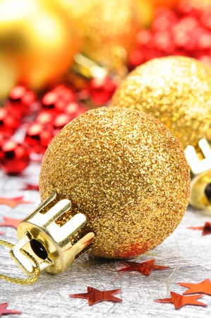 Golden Christmas balls on the festive backgroundの写真素材