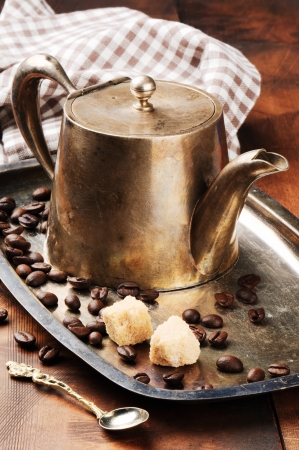 Vintage coffee pot on antique silver trayの写真素材