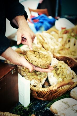 Selling various bread at traditional european marketの写真素材