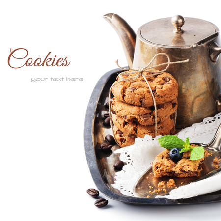 Chocolate chip cookies and coffee in vintage settingの写真素材